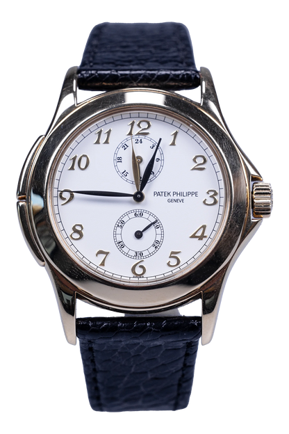 Patek Philippe Travel Time 5134J — weißes Zifferblatt, Gelbgoldgehäuse, Lederband Patek Philippe Travel Time Ref. 5134J