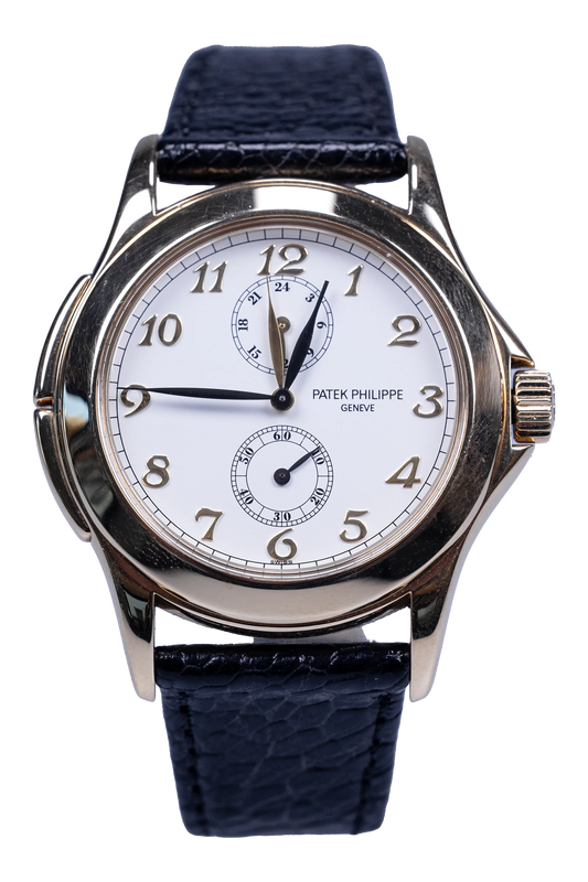 Patek Philippe Travel Time 5134J — weißes Zifferblatt, Gelbgoldgehäuse, Lederband Patek Philippe Travel Time Ref. 5134J