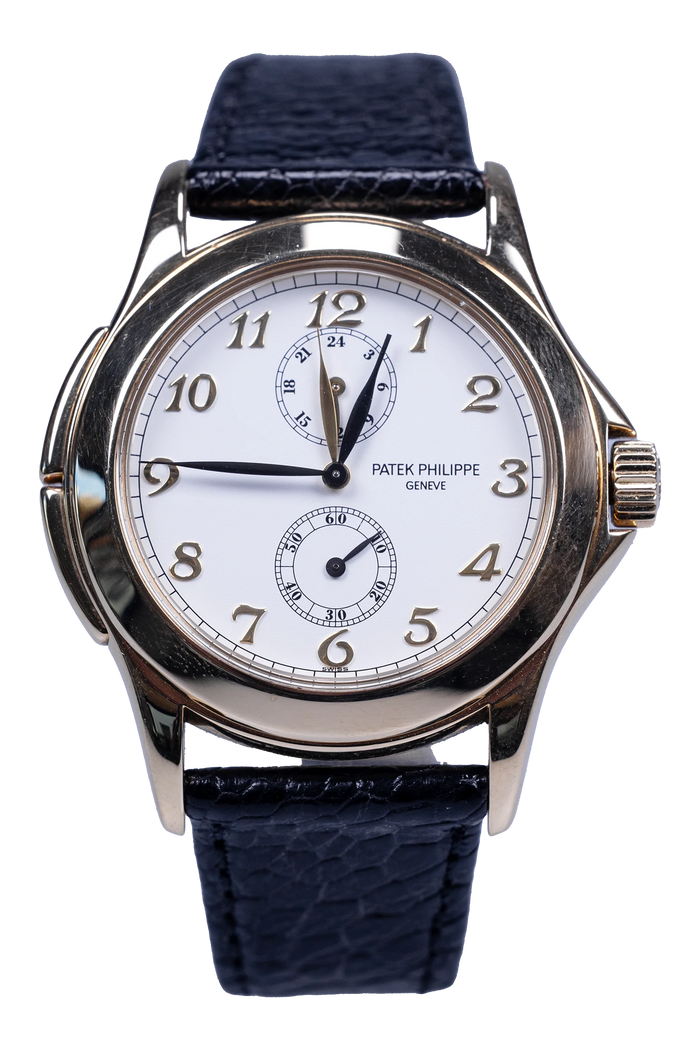 Patek Philippe Travel Time 5134J — weißes Zifferblatt, Gelbgoldgehäuse, Lederband Patek Philippe Travel Time Ref. 5134J